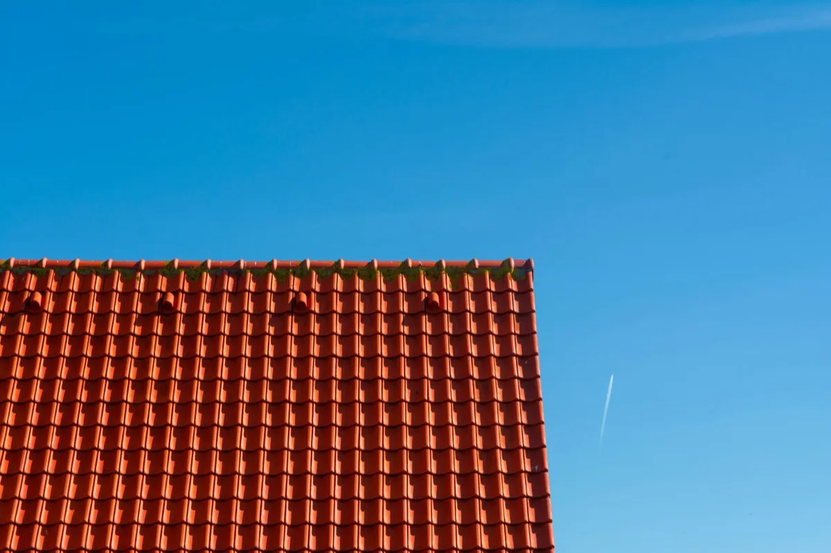 Tile roof gable in full sun, the kind of exposure that sets roof life in Dothan, AL